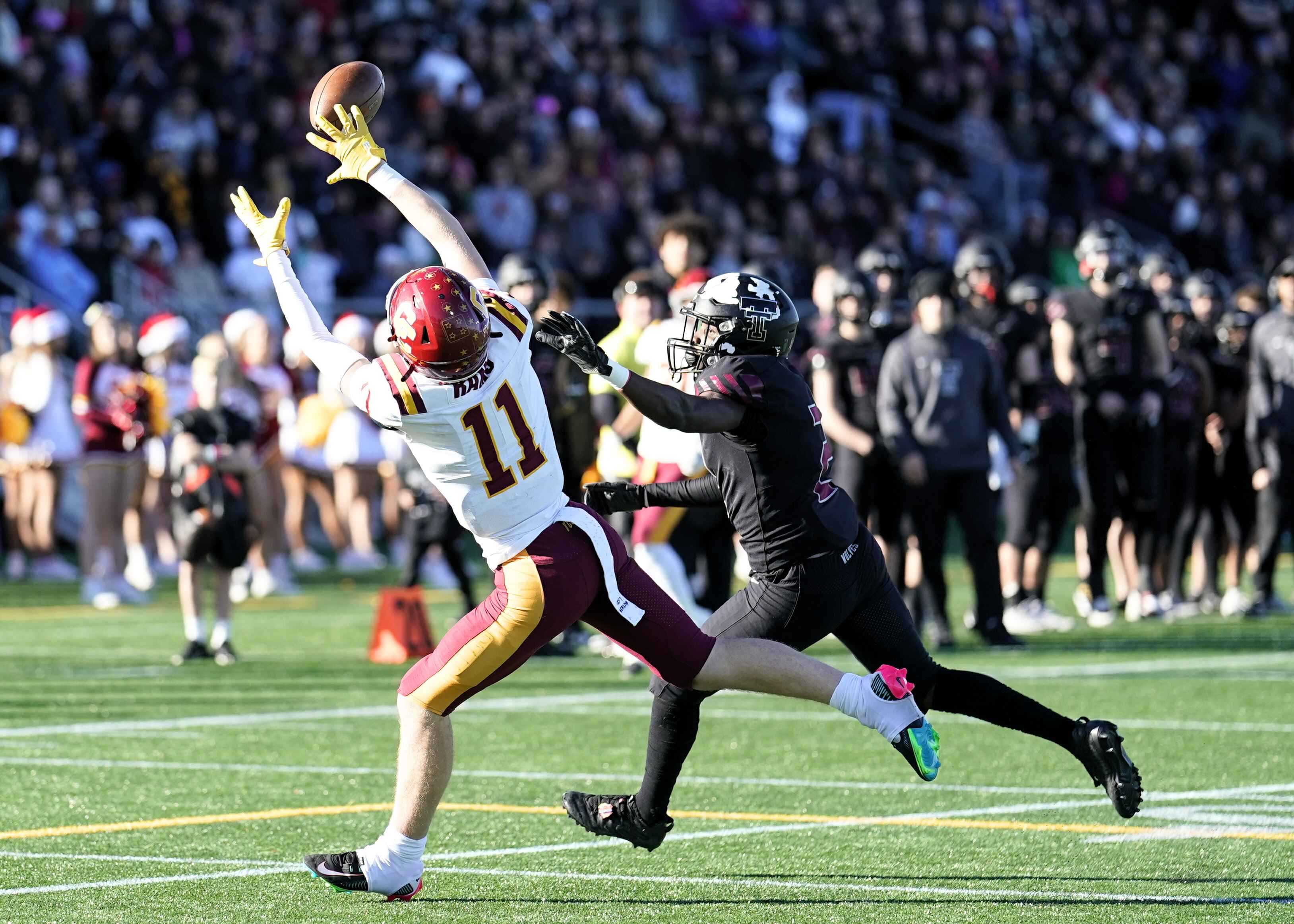 Central Catholic receiver Pomer Davison (11) goes deep against Tualatin in last year's 6A football final. (Photo by Jon Olson)