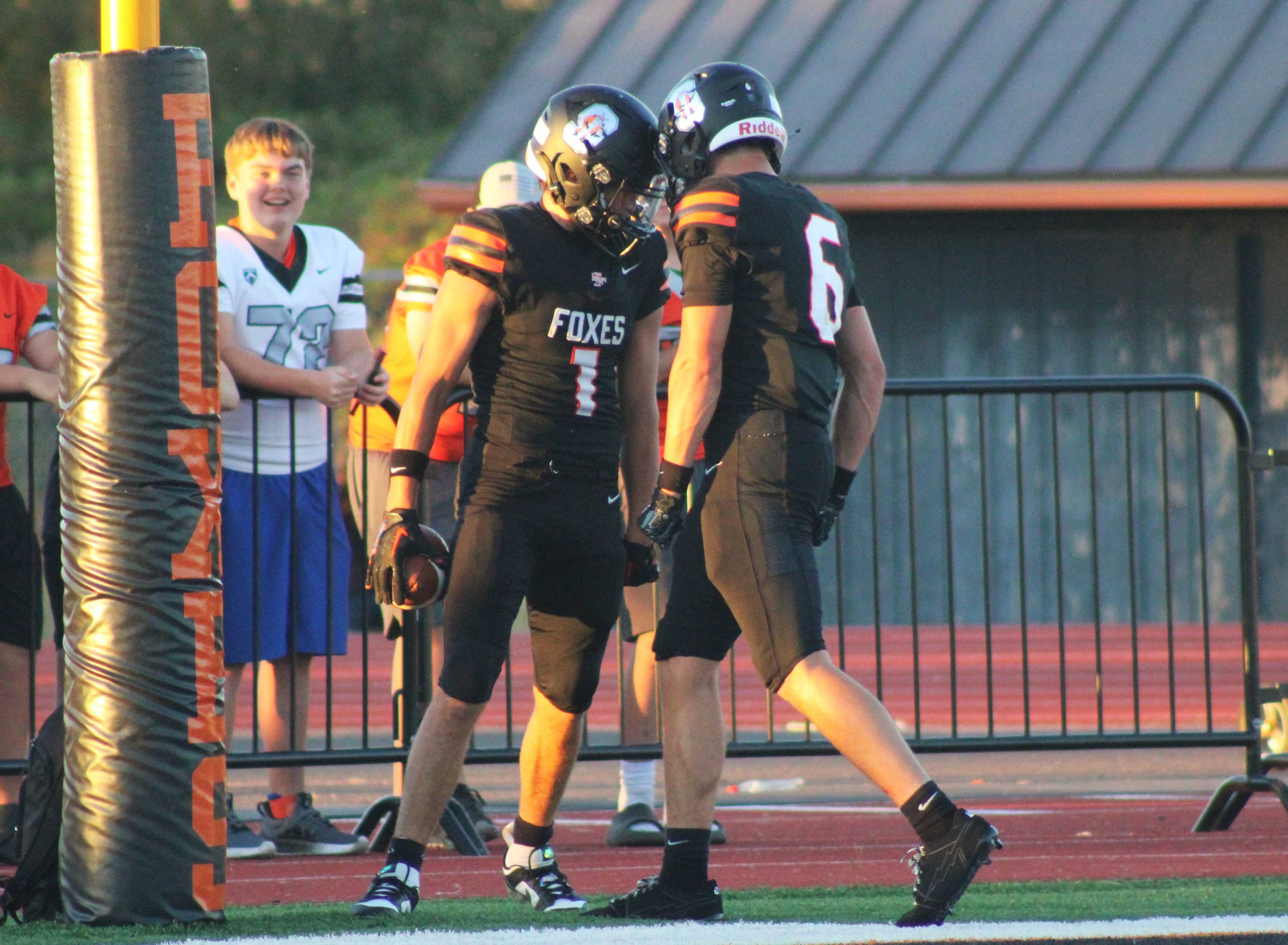 Silverton's Hudson Waples (1) celebrates a touchdown catch with Logan Uitto (6) on Friday night. (Photo by Jeremy McDonald)