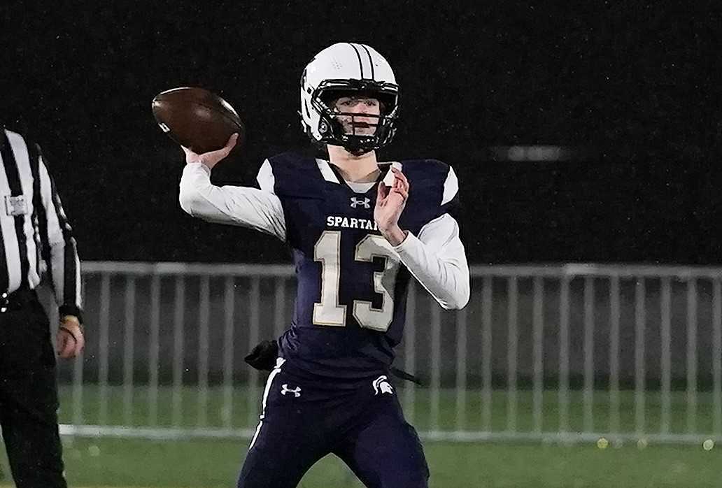 Marist Catholic senior quarterback Nick Hudson has thrown for 734 yards and 10 touchdowns in two games. (Photo by J.R. Olson)