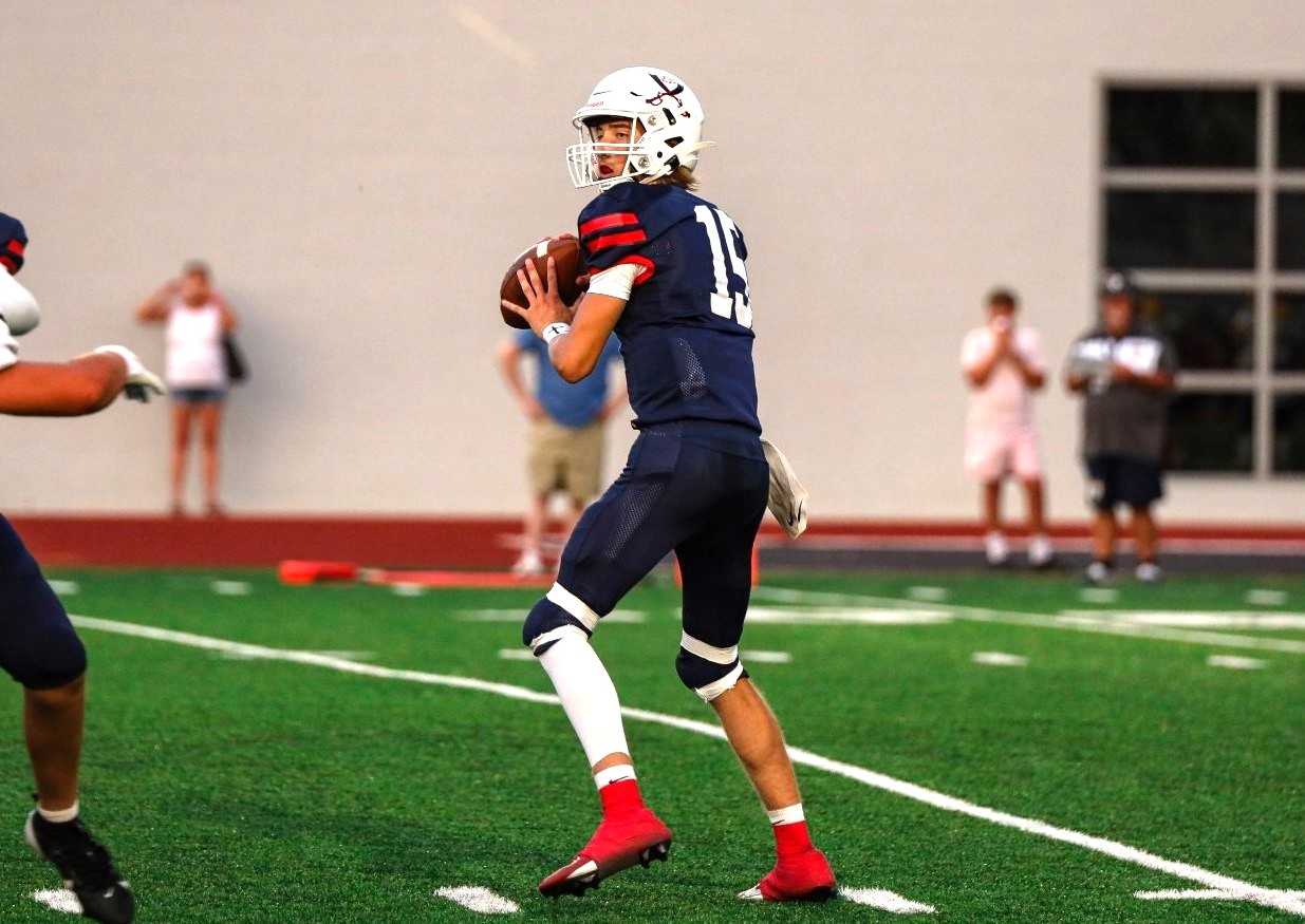 Phoenix senior quarterback Payton Turner is making strides in his second season of football. (Photo by Christopher Plouhar)