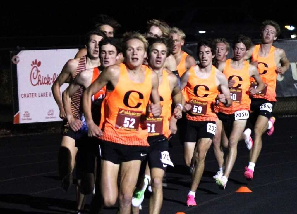 Crater senior Tayvon Kitchen (52) leads the pack in the Crater Twilight Invitational on Oct. 17. (Photo by Haley Dixon)