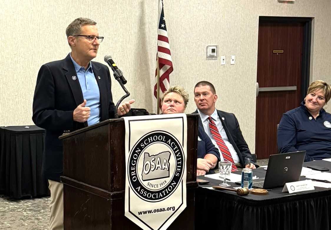 Steve Walker, addressing a meeting of the OSAA delegate assembly, relished his role in the OSAA's 'high-energy' environment.