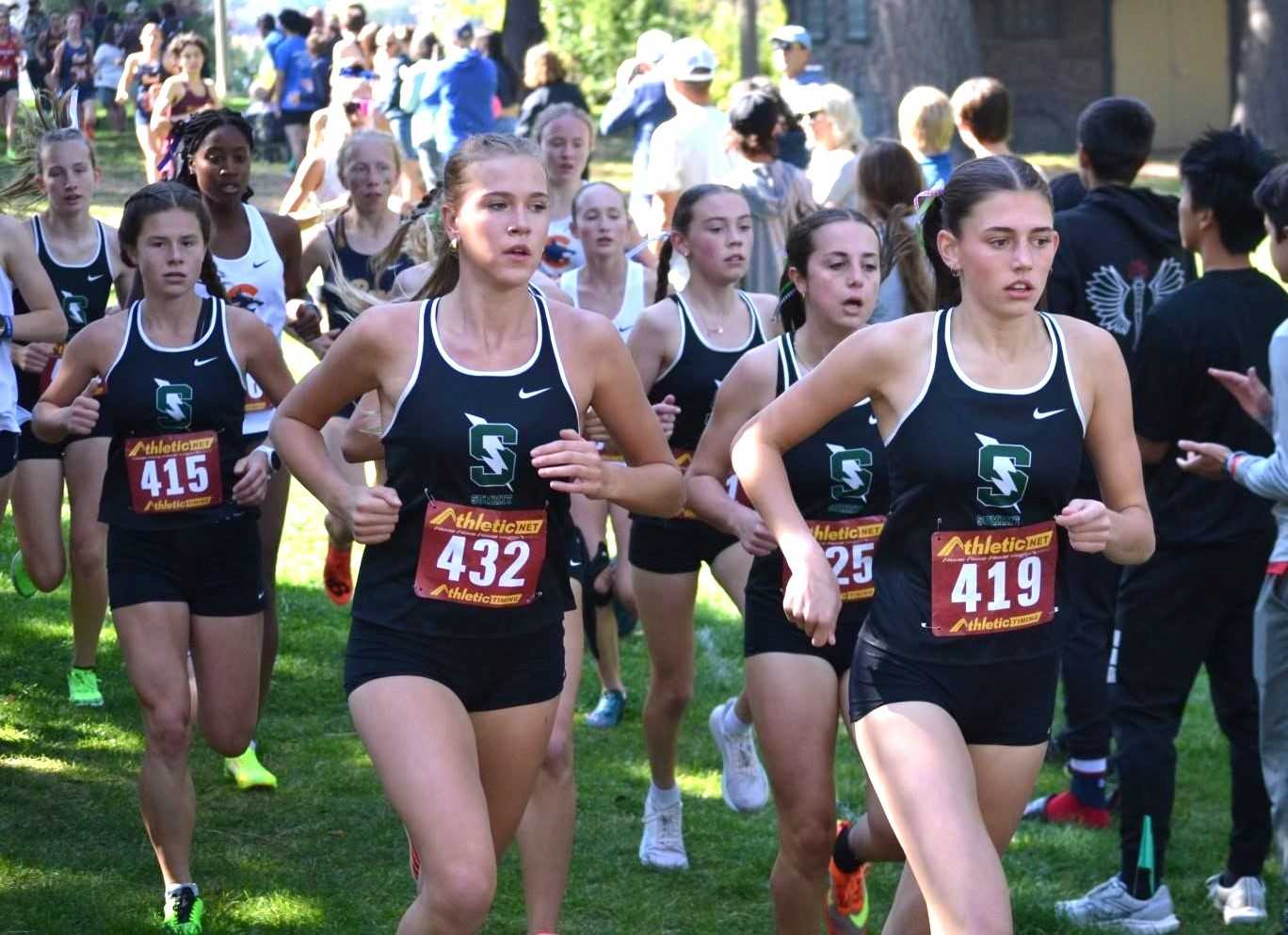 Sophie Capozzi (419), Skye Knox (432) and Eva Dicharry (second from right) have set the pace for Summit. (Summit HS)