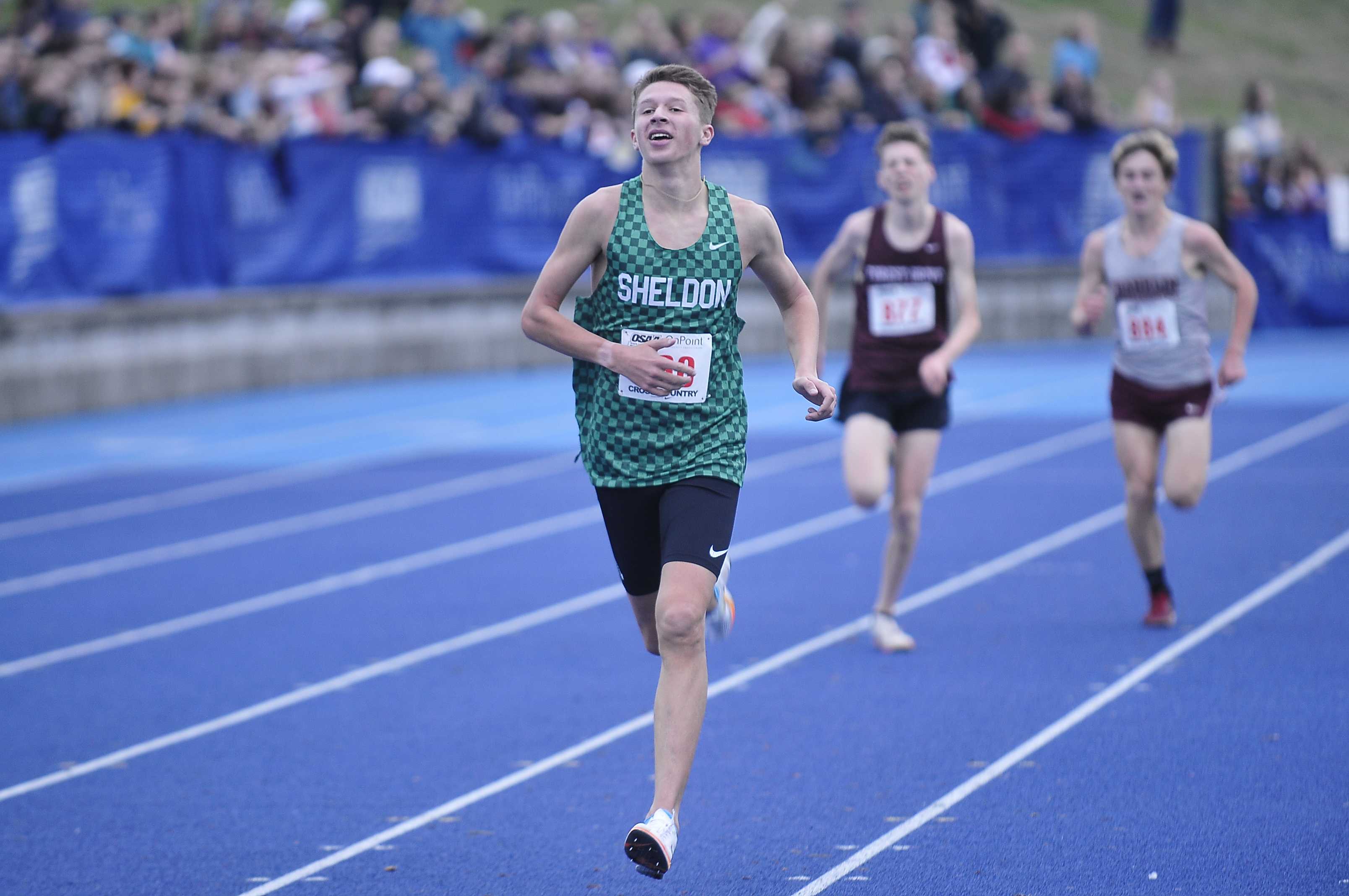 Sheldon junior Malachi Schoenherr sprints to the 6A boys title Saturday at Lane Community College. (Photo by John Gunther)