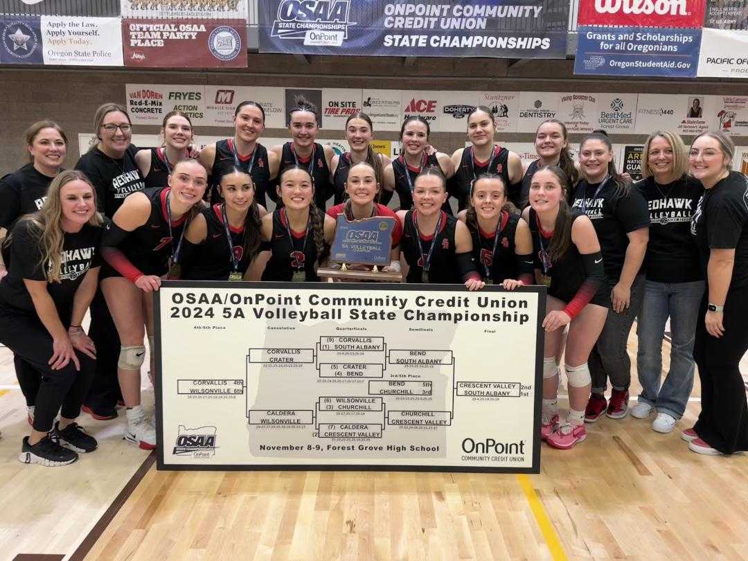 South Albany's volleyball team poses with the 5A bracket after dropping Crescent Valley on Saturday night. (Photo by J.R. Olson)