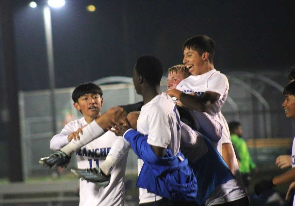 Blanchet Catholic players carry Cristian Gonzalez after his overtime goal against No. 4 Dayton. (Photo byJeremy McDonald)