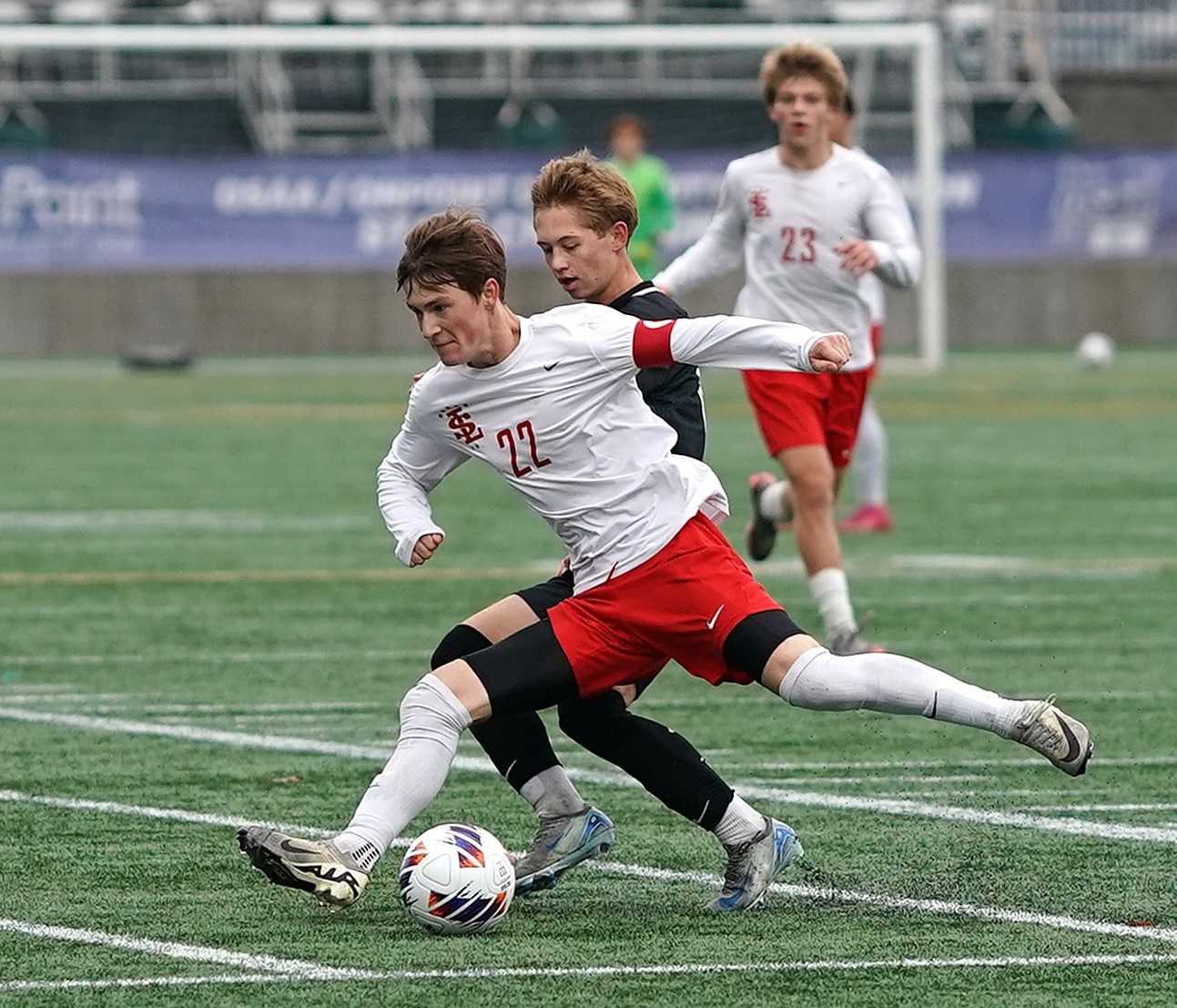 La Salle Prep's Conor Garvey battles against Summit in the 5A boys soccer final Saturday. (Photo by J.R. Olson)