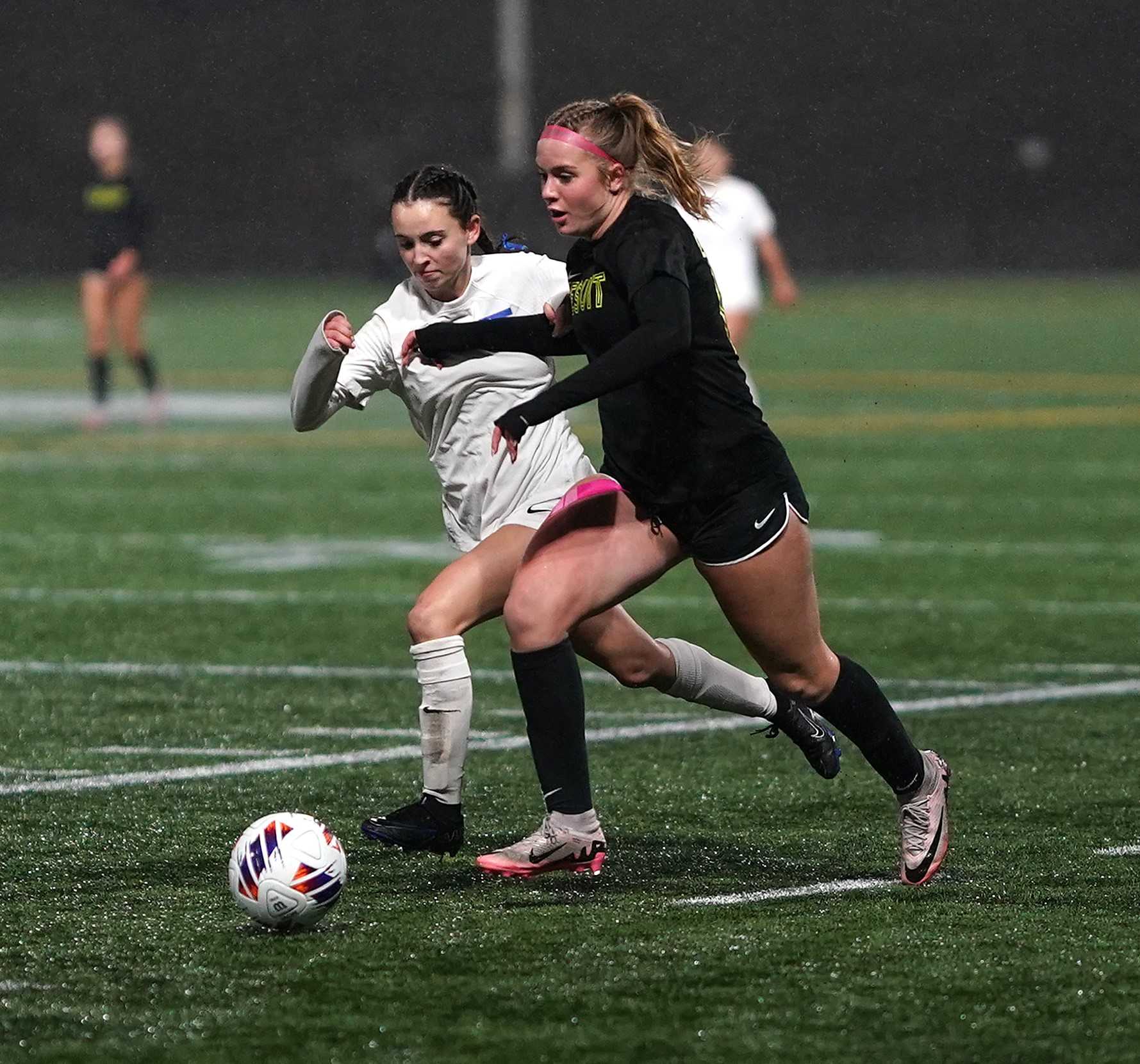 Jesuit's Natalie Webber, working against Grant's Sadie Melville, scored her 21st goal of the season. (Photo by J.R. Olson)