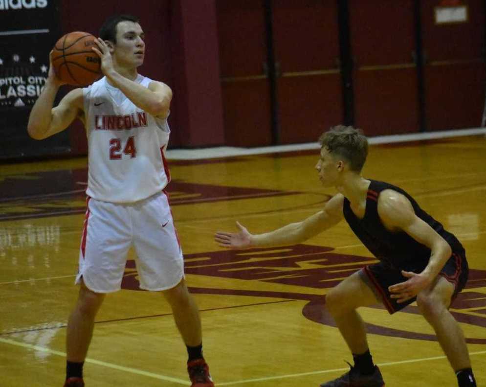 Daniel Kovalev (24) scored 16 points for Lincoln against North Salem. (Photo by Jeremy McDonald)