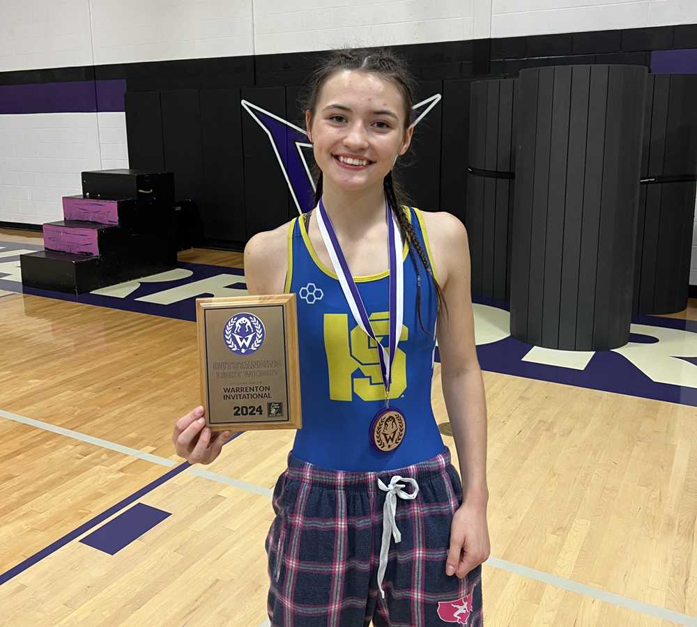 Knappa junior Kiya Roe impressed last weekend by winning two tournaments, including pinning her way through a boys event