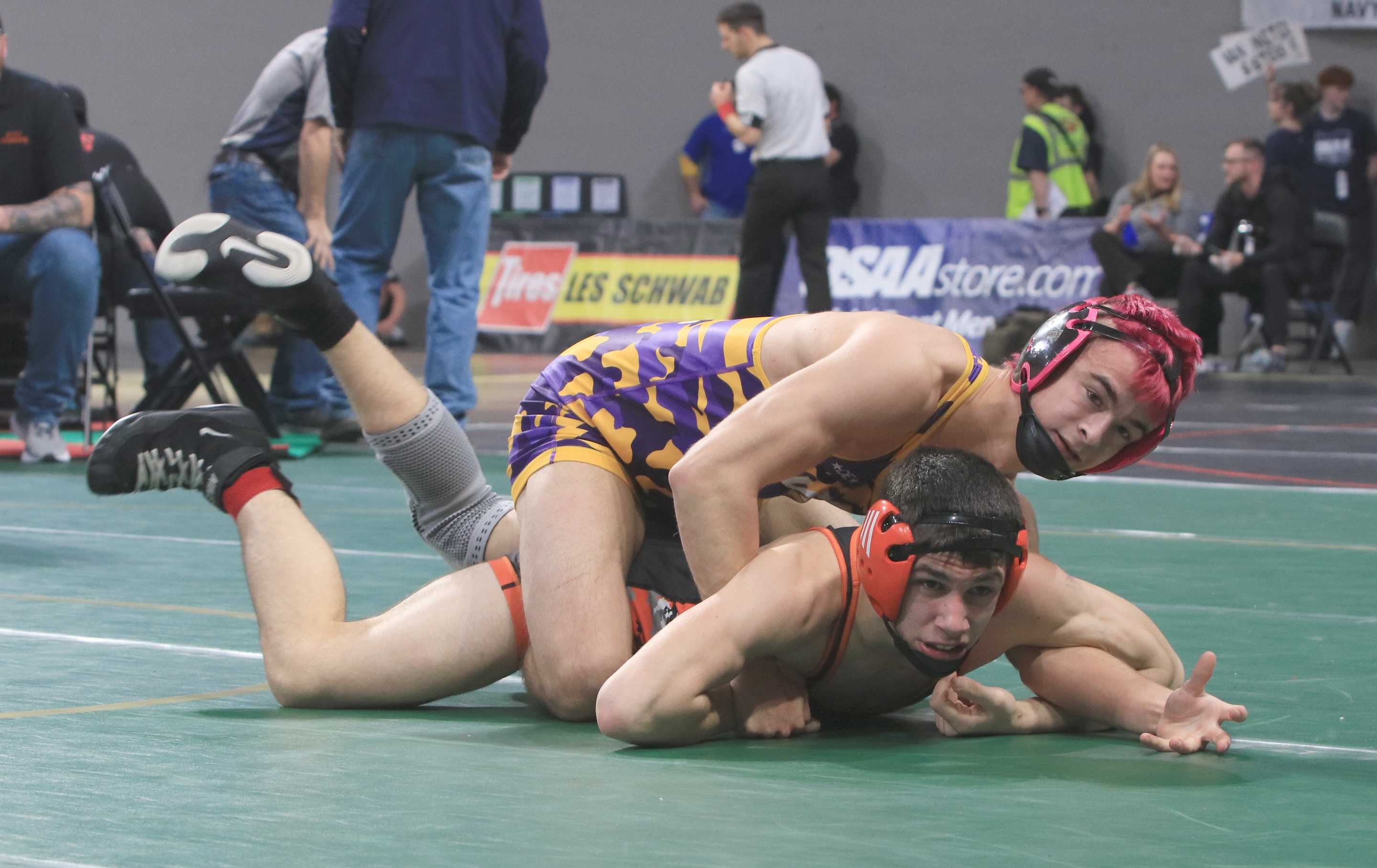 Burns' Kale Cornell (top) defeated Scio's Jack Forson during Thursday's 3A boys wrestling quarterfinals. (Jim Beseda photo)