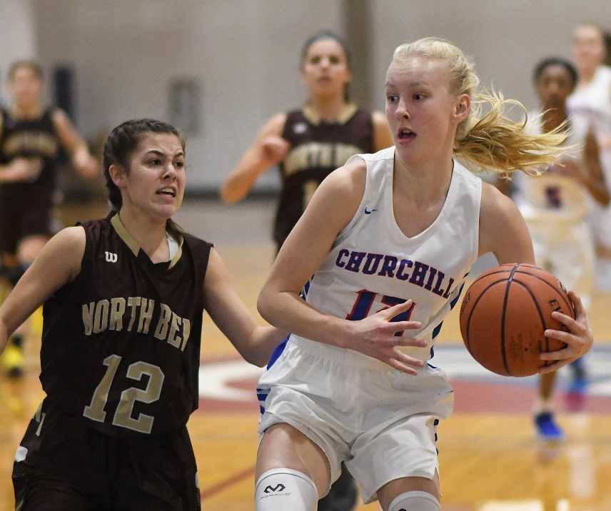 Churchill freshman Danika Starr (right) is averaging a team-high 18.7 points. (Photo by Joe Richter)