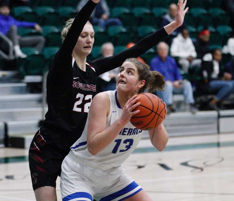 Grant's Schuyler Berry (13) looks to shoot against Southridge's Cameron Brink. (Photo by Norm Maves Jr.)