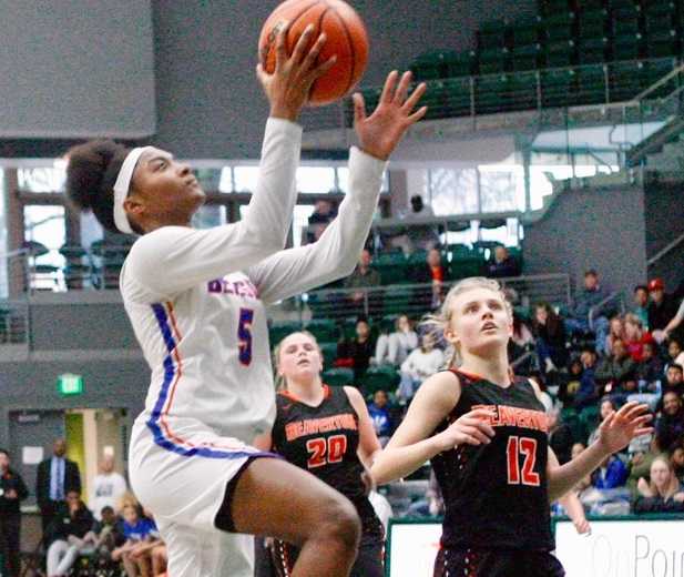 Benson's Tayler Lyday beats Beaverton's Mary Kay Naro (12) for two of her game-high 19 points. (Photo by Norm Maves Jr.)