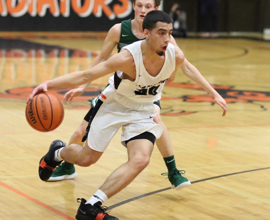 Damian Zaines scored a game-high 18 points in Gladstone's win Friday. (Photo by Jacob Ellingson)