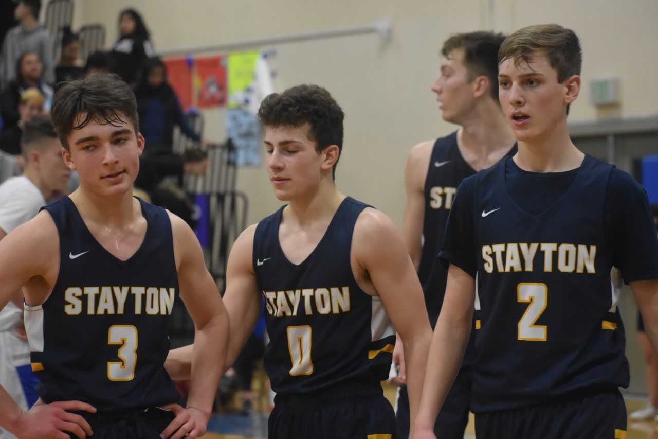 Stayton's Ben Rash (3), Logan Classen (0) and Jordan Butler (2) helped lead Friday's win at Woodburn. (Photo by Jeremy McDonald)