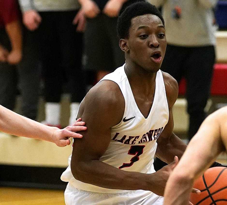 Sophomore point guard Wayne McKinney scored 13 points for Lake Oswego on Friday. (Photo by Jon Olson)