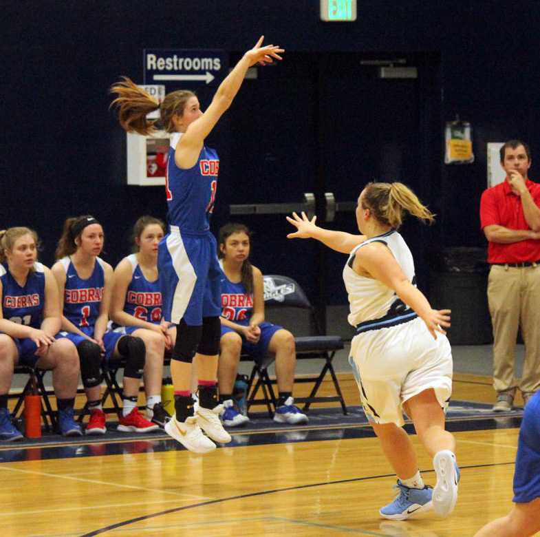 Colleen McLaughlin launches for Central Linn, which opens against the defending state champs. Photo by Seandra Reese