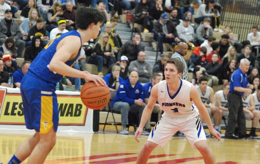 Jayce Roth (3) squares up on Conner Marchant. Roth's defense sparked Western Christian's advance in a 2A semifinal on Friday