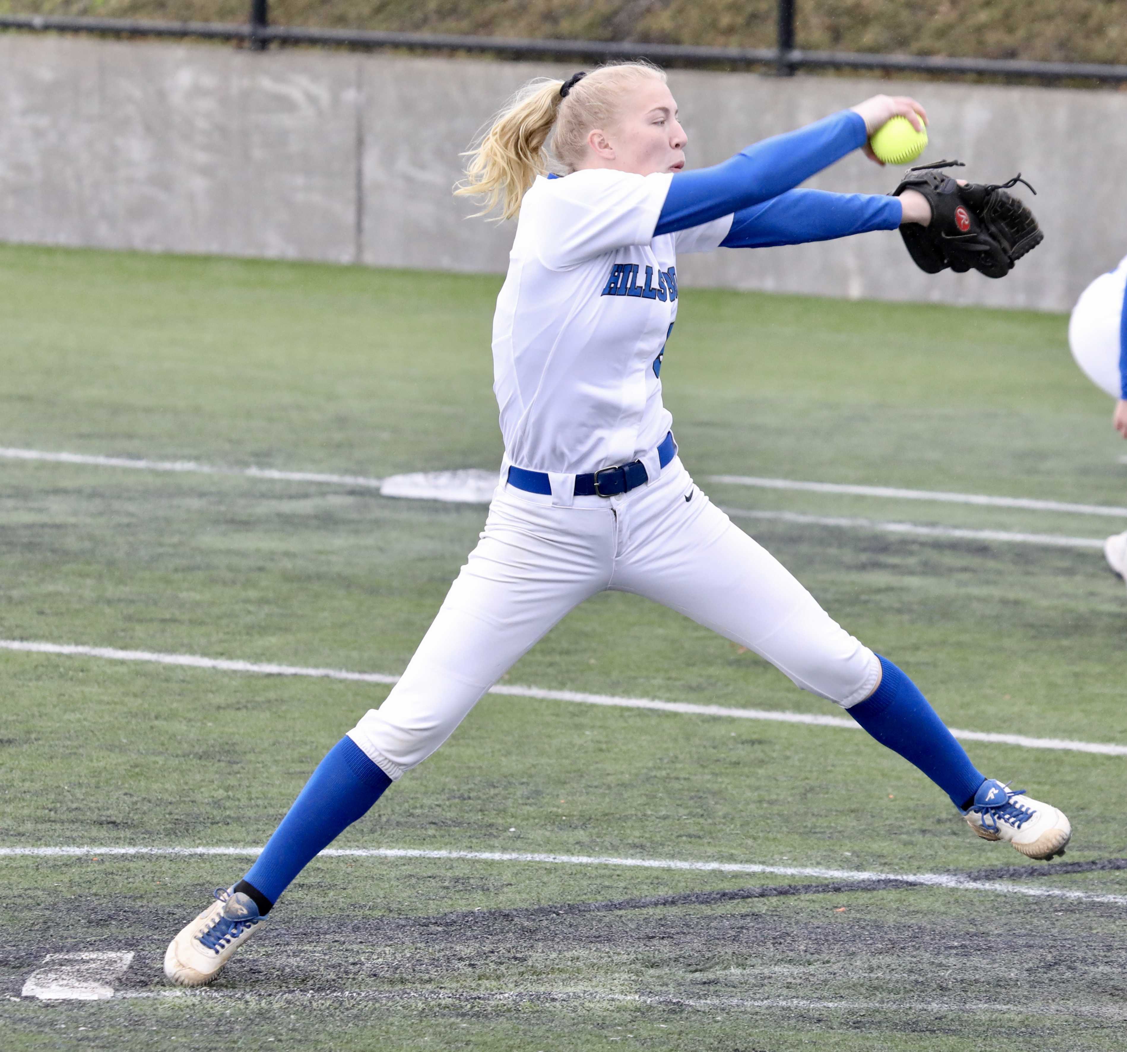 Hillsboro junior Mckenzie Staub loads up to fire another fastball past a Putnam batter. She struck out 15. (Norm Maves Jr.)