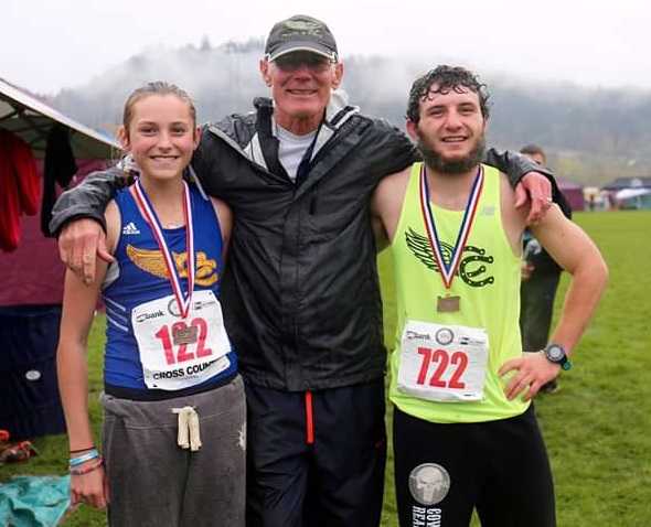 Tracy Smith with Jan Carne (left) and Zach Lawson (right) after the 2017 state meet.