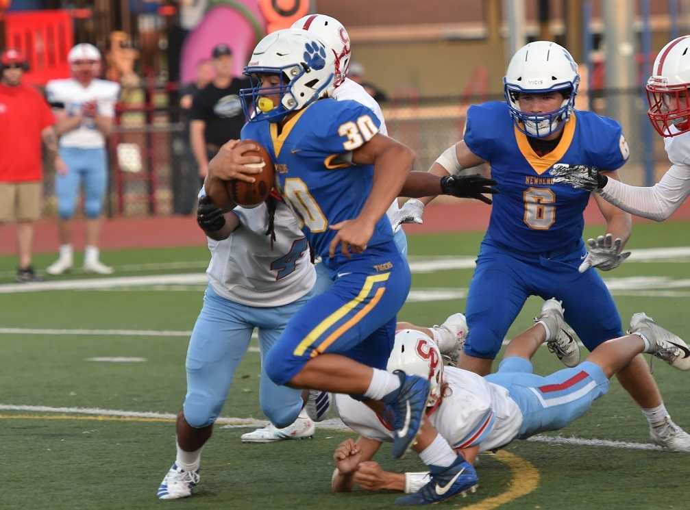 Newberg sophomore fullback Price Pothier has rushed for 986 yards this season. (Photo by Dean Takahashi)