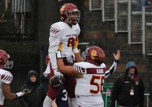 Central Catholic's Silas Starr celebrates his touchdown catch in Saturday's 49-28 win over Lake Oswego. (Norm Maves Jr.)