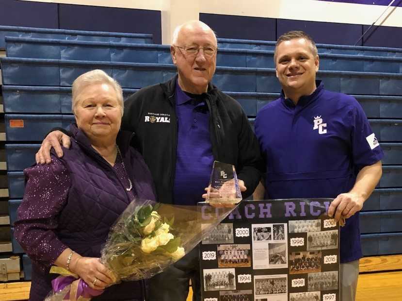 Rich Remsburg (center), with wife Sue and Kyle Cowan, won 537 games at Portland Christian.(Photo courtesy Portland Christian HS)