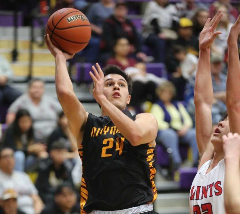 Nixyaawii senior Mick Schimmel scored a team-high 25 points against Trinity Lutheran. (NW Sports Photography)