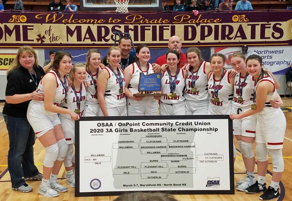 A year after winning its first title, Clatskanie celebrated a second one Saturday night. (Photo by Andrew Millbrooke)