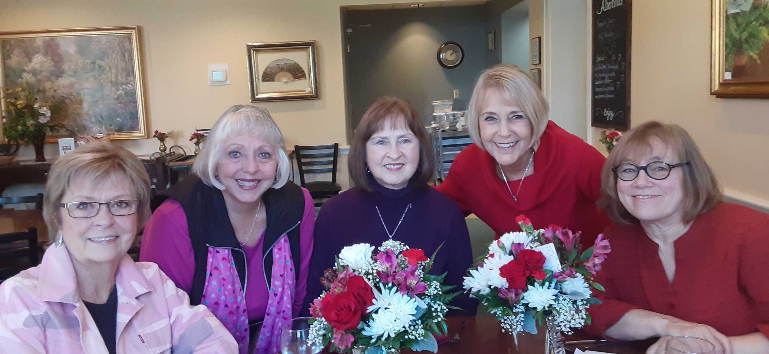 Karen Floyd (second from left) and Roe Ann Oberg (center) with past Lifetime Achievement honorees.