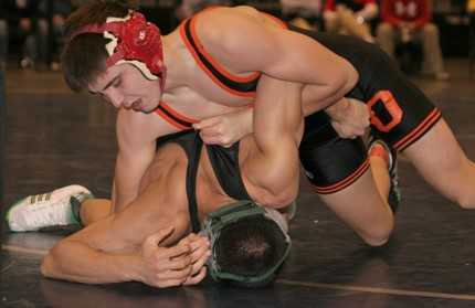 RJ Pena (top) was 173-3 over his career at Sprague and ended on a 147-match winning streak
