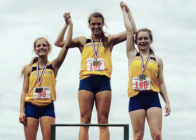 Danelle Woodock (107), Sara Turner (106) and Macie Allen celebrate on the podium in this photo supplied by Barlow HS