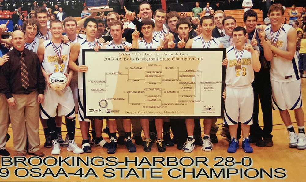 Fred Corpening (far right), who grew into a basketball star, celebrates the 2009 state title with his Bruin teammates