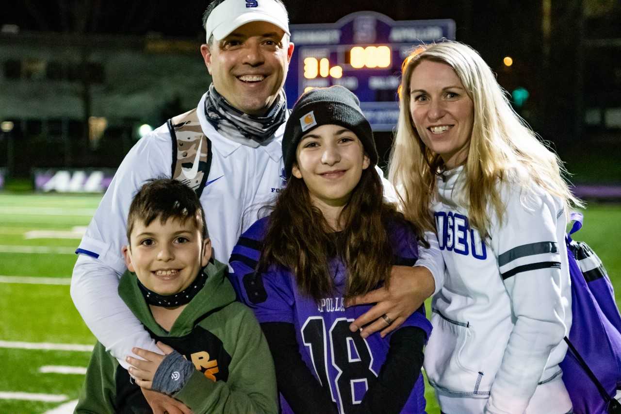 New Forest Grove coach Dominic Ferraro with his wife Beth and their children, Colton, 9, and Peyton, 12.