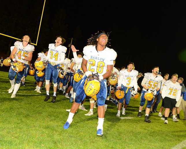 Jobadiah Malary (28) and Barlow celebrated coach Terry Summerfield's 100th win Thursday. (Photo by Chris Holzbach)