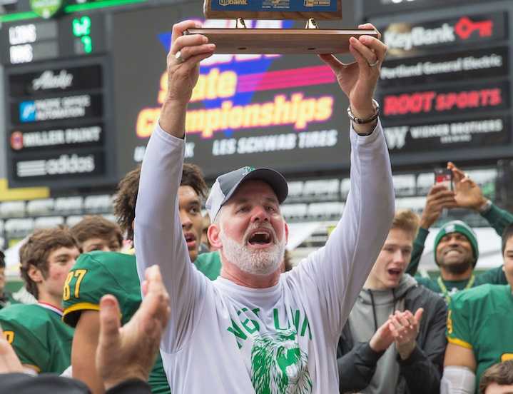 Chris Miller and the West Linn Lions won their only OSAA championship blue trophy in 2016. (Photo by Brad Cantor)