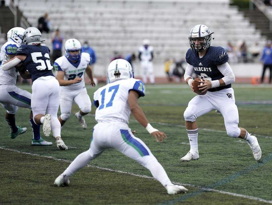 Wilsonville's Chase Hix had three touchdown passes Saturday, giving him nine in three games. (Photo by Jon Olson)