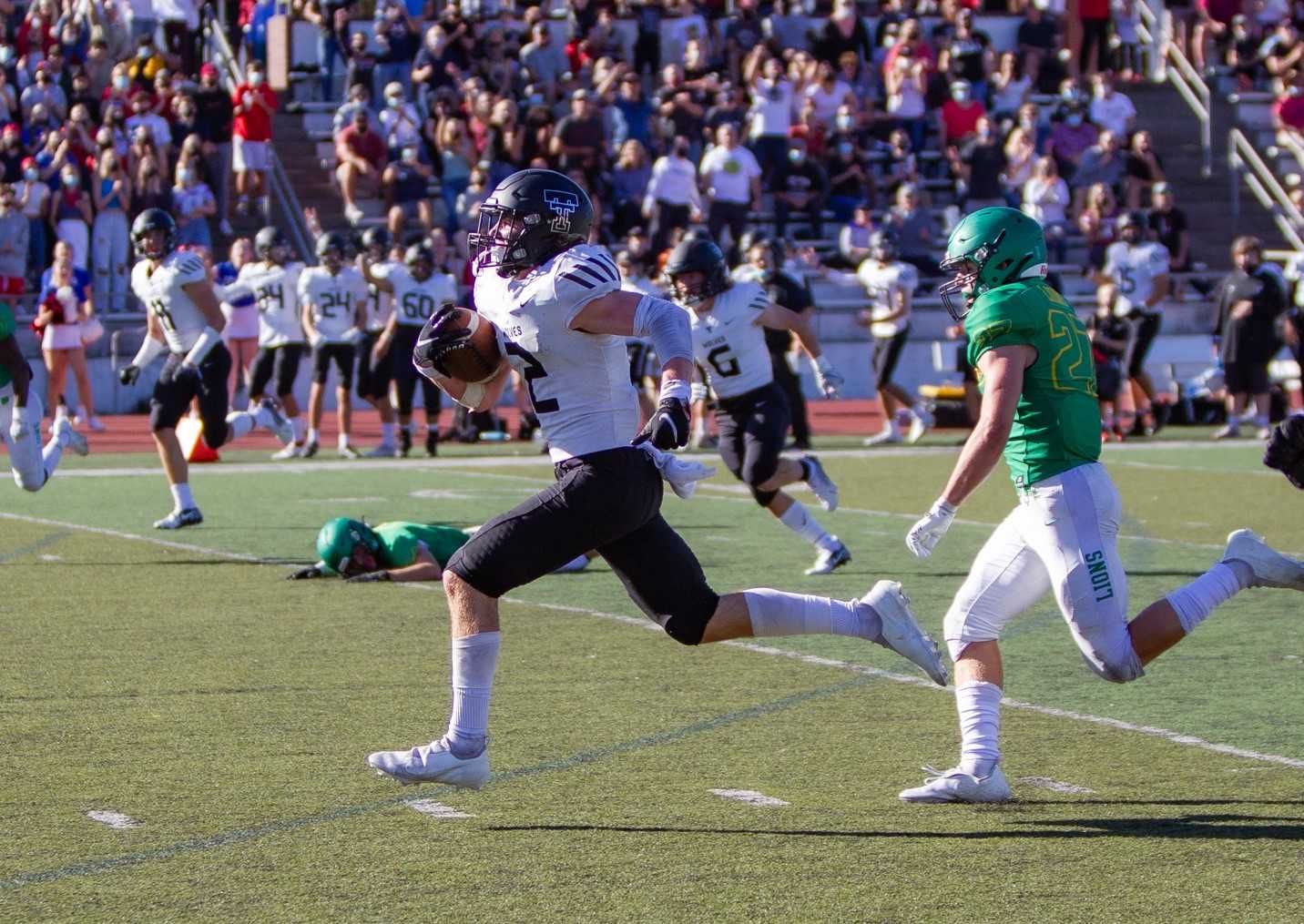 Tualatin's Cole Prusia had seven catches for 188 yards and three touchdowns Saturday. (Photo by Brad Cantor)