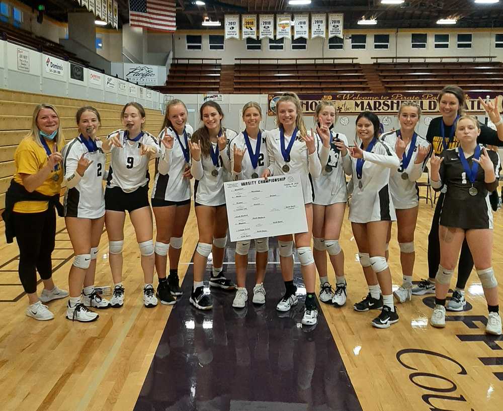 North Bend celebrates after winning the Marshfield Tournament on Oct. 9. The Bulldogs enter the 5A playoffs seeded second.