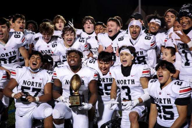 North Salem players celebrate beating McKay to clinch a playoff berth. (Abigail Dollins/Statesman Journal)