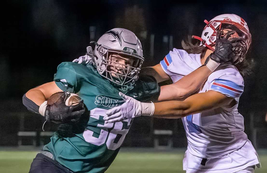 Summit senior Jack Clemans (36), running against South Salem, leads the Storm's defense at linebacker. (Photo by Mike Nelson)