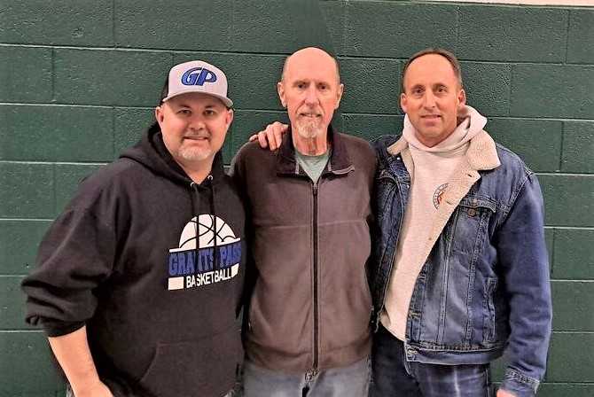 Mike Mann (center) reconnected with Kevin Hill (left) and Ron Fien (right) at Thursday's meeting of Grants Pass officials.