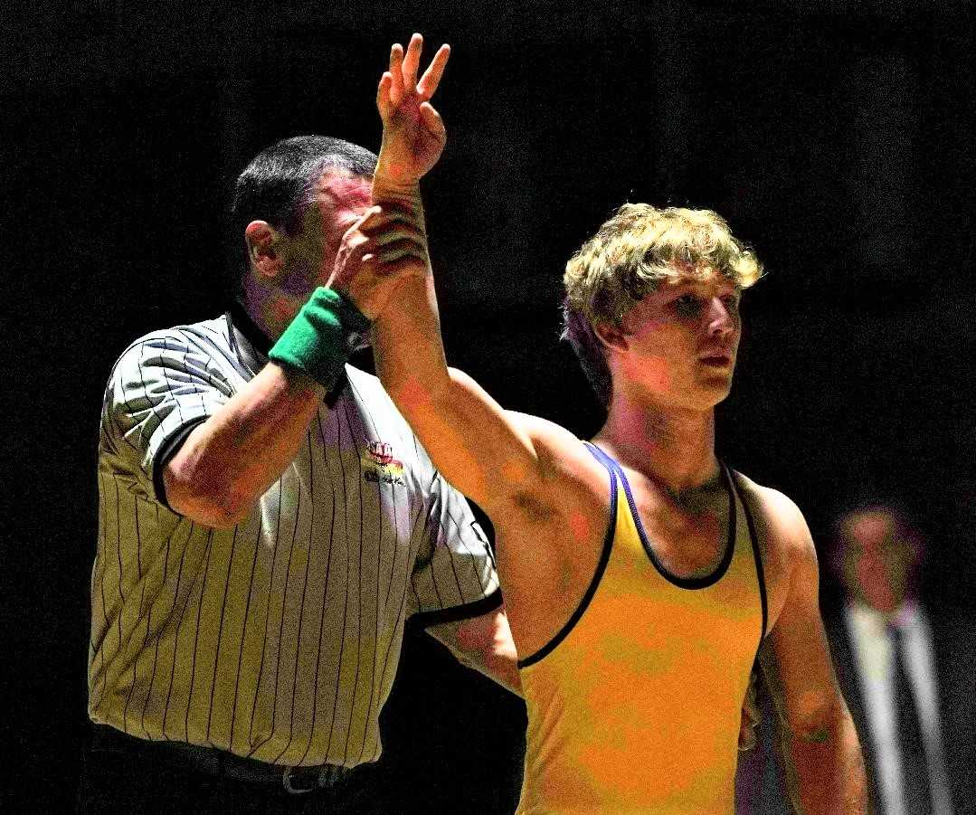 Newberg's Ayden Garver pinned teammate Trae Frederick to become the school's second four-time champion. (Photo by Jon Olson)