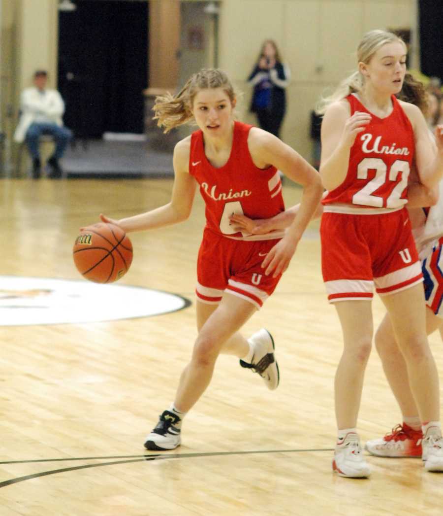 Audrey Wells (with ball) and Callie Glenn sparked gritty Union to the semifinal win