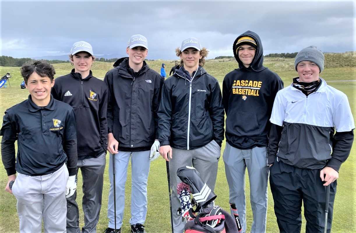 Captain Ramsey Gordon (right) leads a Cascade team that has closed in on a school-record round. (Photo courtesy Cascade HS)