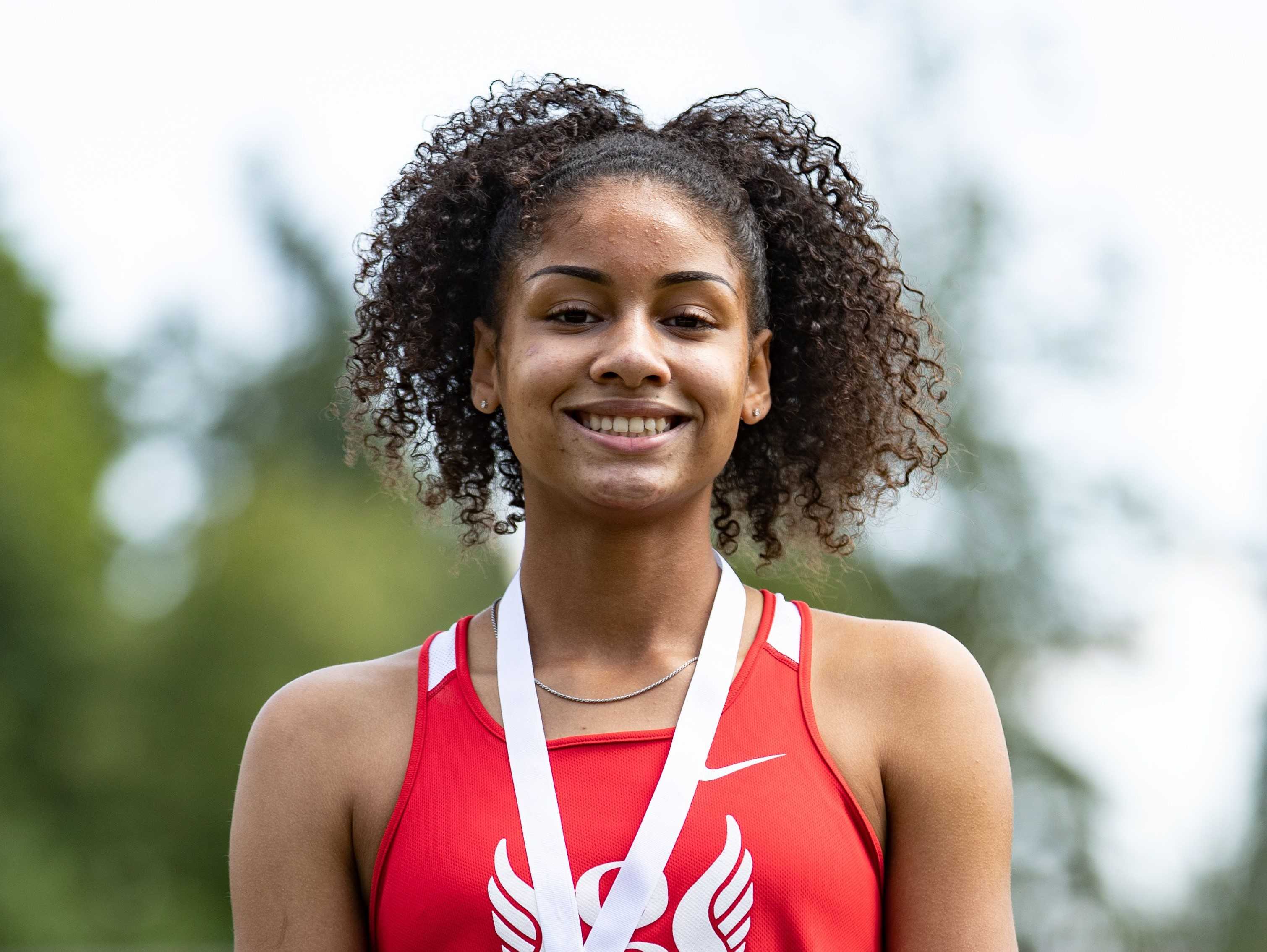Oregon City junior Sophia Beckmon long-jumped 19-11 in the Nike/Jesuit Twilight Relays. (Photo by Howard Lao)