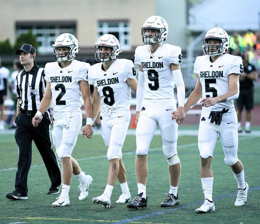 Sheldon's Brock Thomas (2), Zach McEwen (8), Luke Leighton (9) and Cade Welch (5) prepare for West Linn. (Photo by Jon Olson)