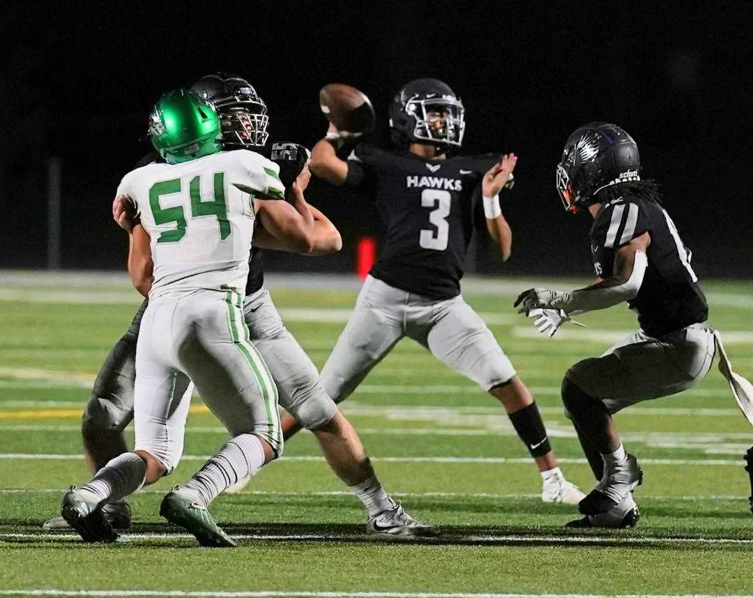 Nelson quarterback Avirey Durdahl threw for 180 yards and three touchdowns against Reynolds on Friday. (Photo by Jon Olson)