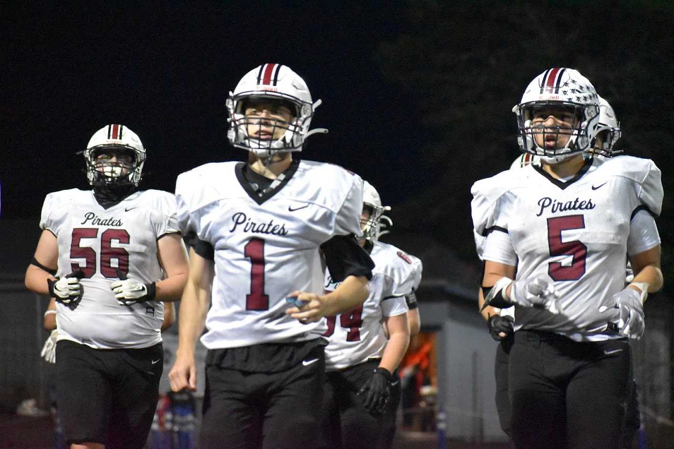 Ethan Hedgecock (56), Boston Hodges (1) and Zach Smith (5) have been integral in Dayton's 3-0 start. (Photo by Amy Webster)